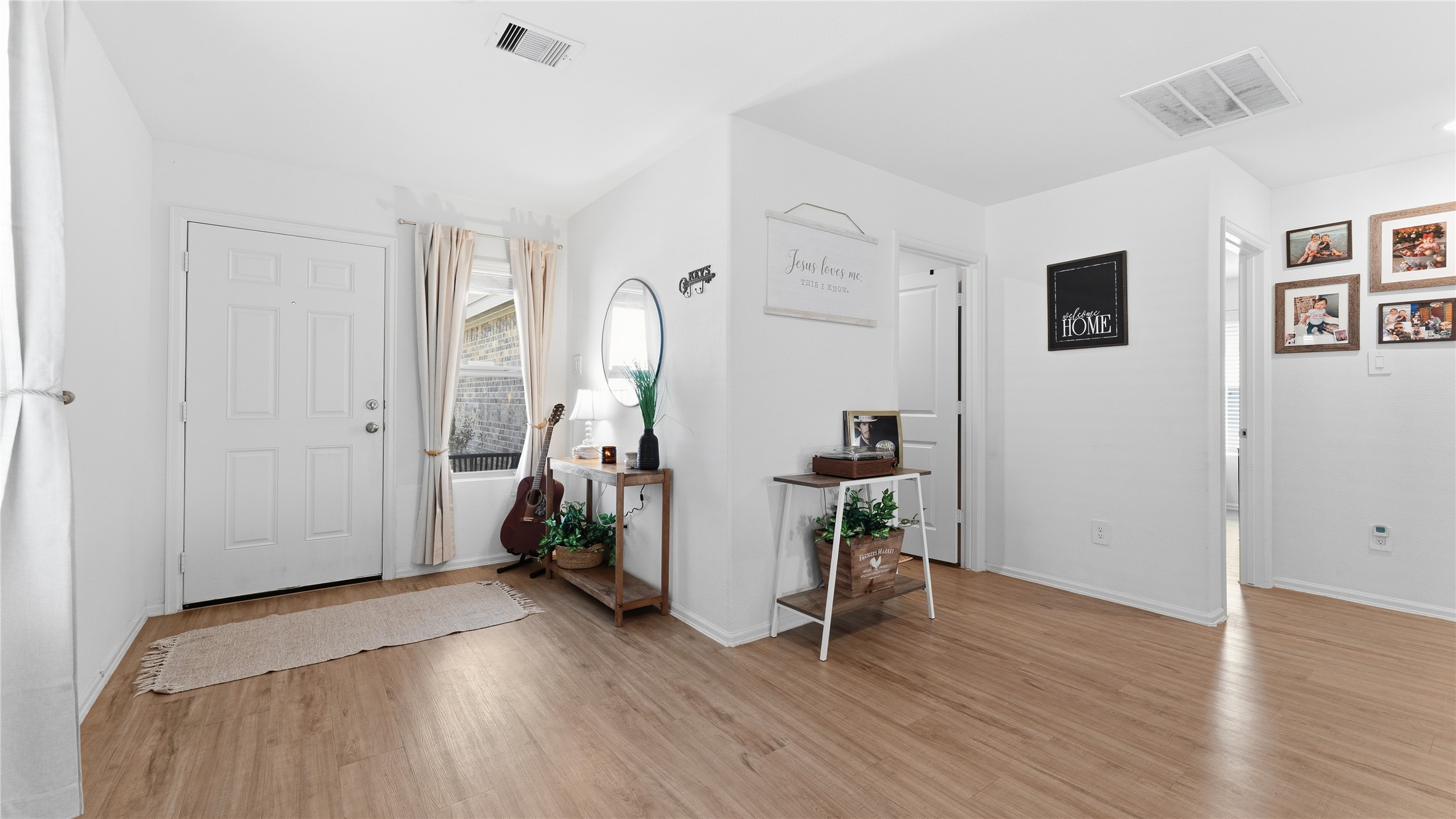 126 Spring Rose Drive Magnolia, TX 77354 - Photo 15 of 48 a view of entryway with wooden floor