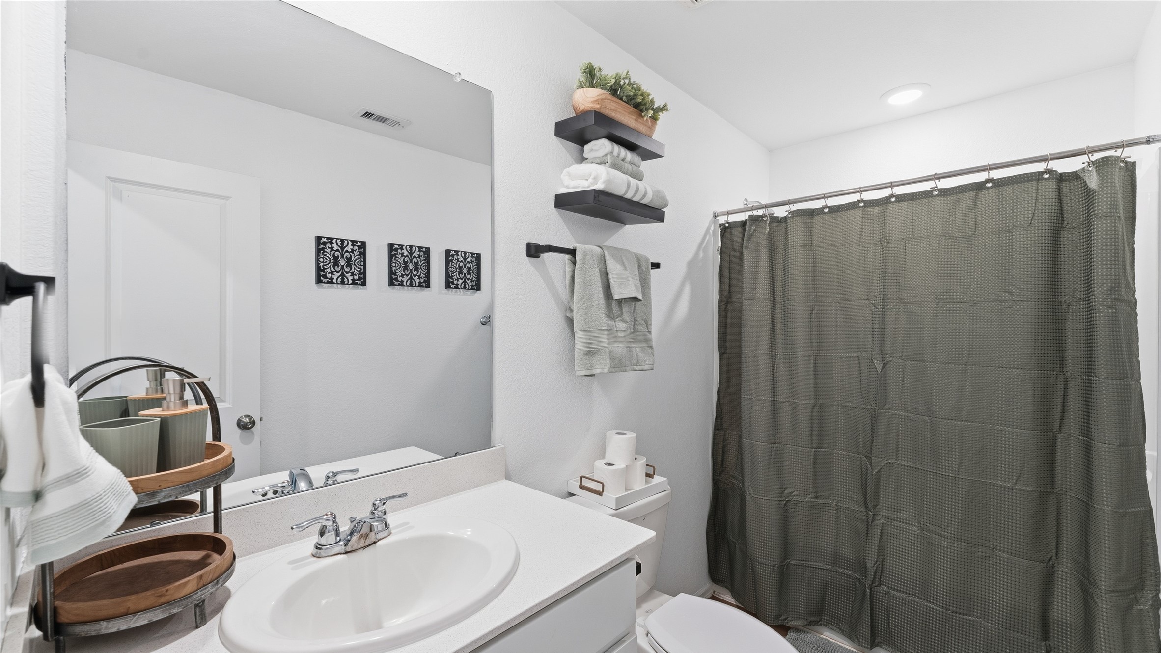 126 Spring Rose Drive Magnolia, TX 77354 - Photo 29 of 48 a bathroom with a sink a toilet and shower