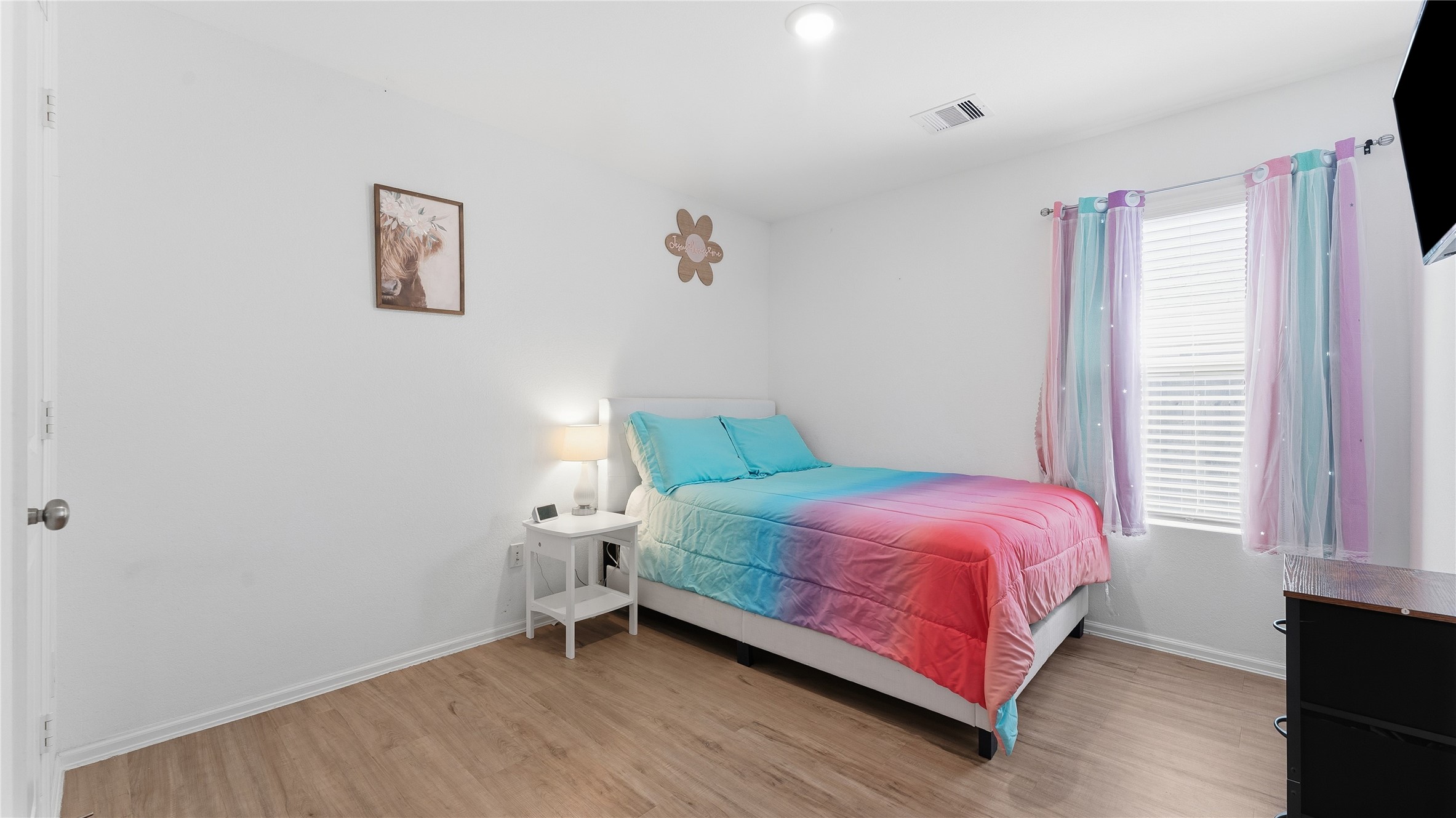 126 Spring Rose Drive Magnolia, TX 77354 - Photo 33 of 48 a bedroom with a bed and a window