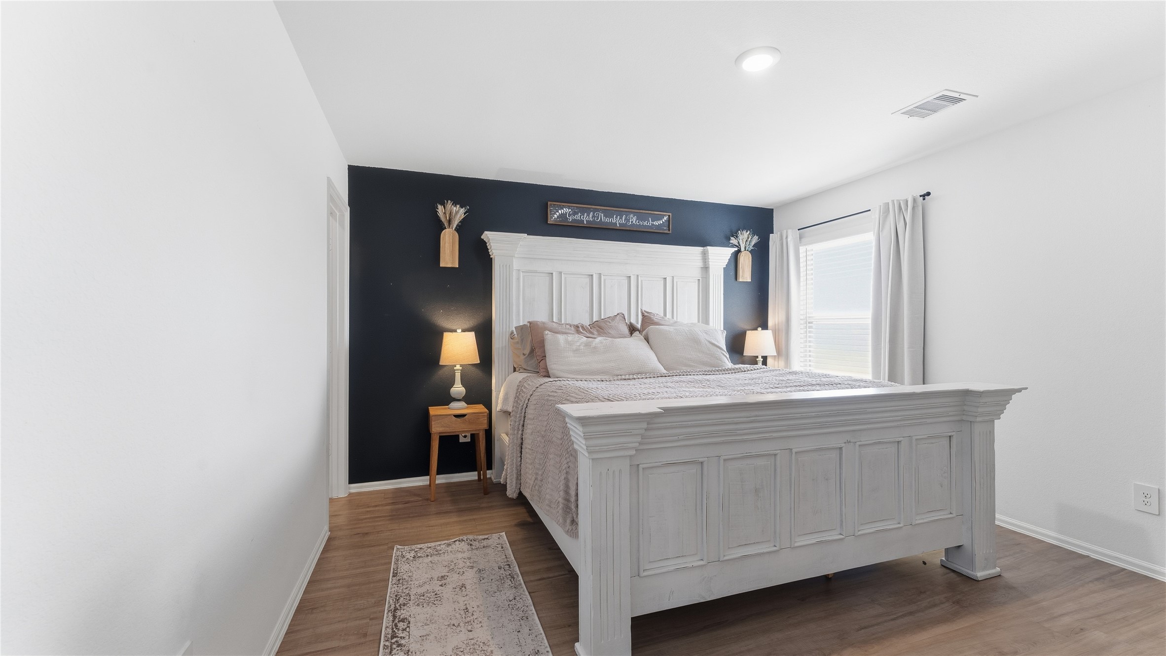 126 Spring Rose Drive Magnolia, TX 77354 - Photo 37 of 48 a room with a bed and a window