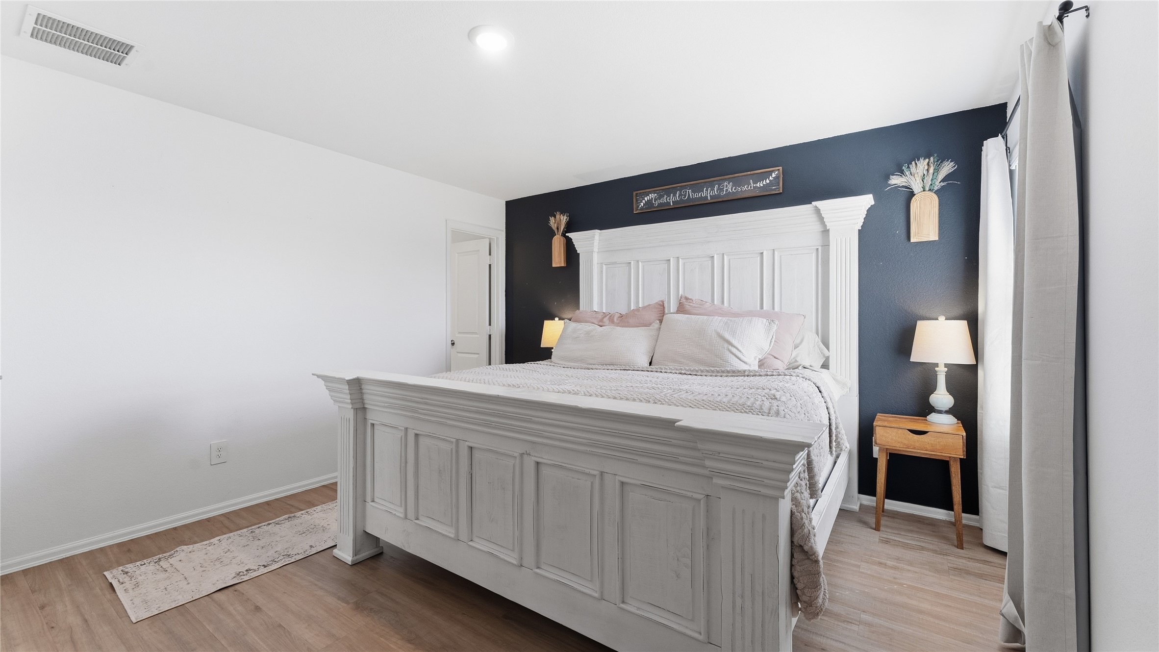 126 Spring Rose Drive Magnolia, TX 77354 - Photo 38 of 48 a bedroom with a bed and a closet