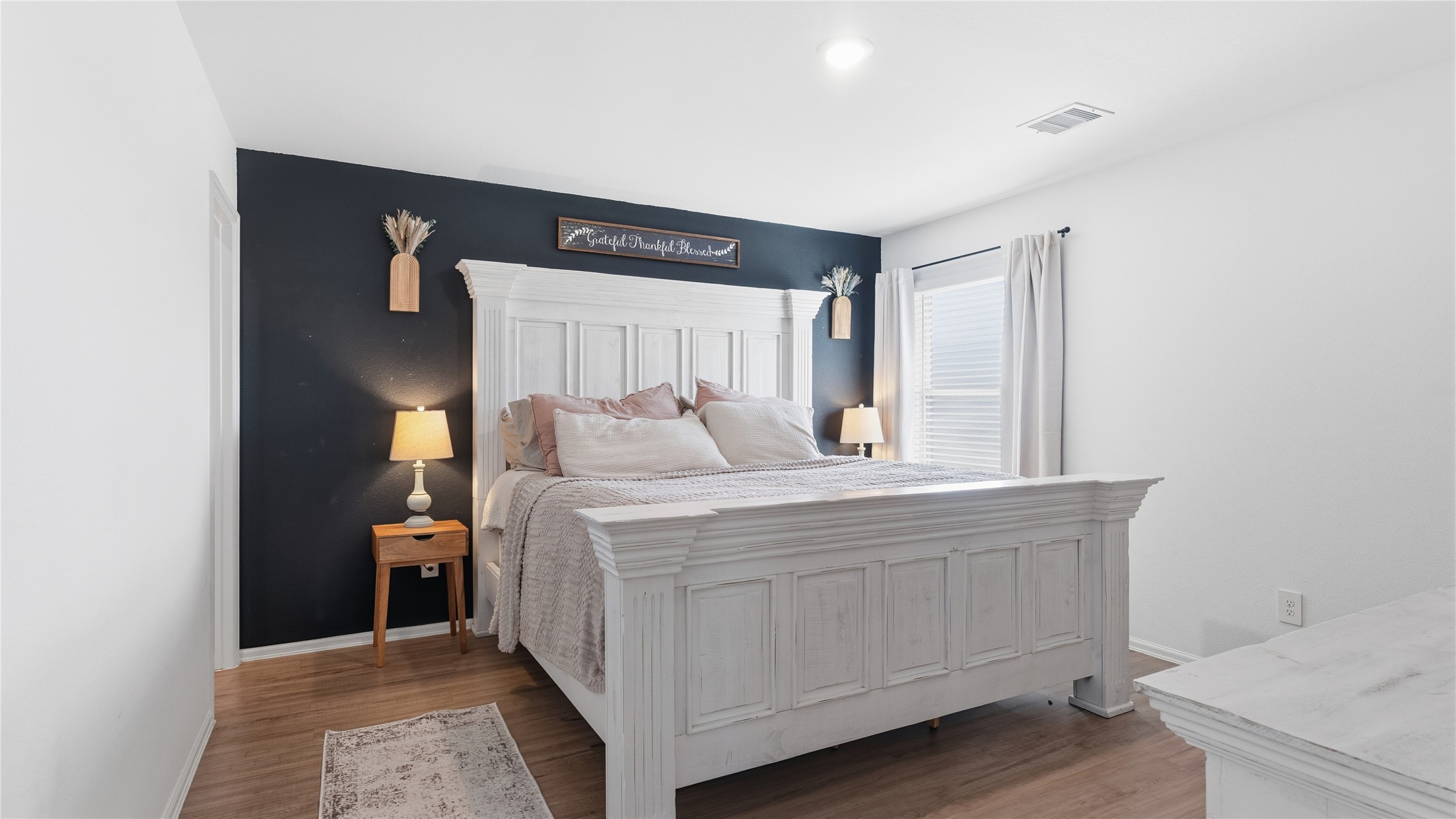 126 Spring Rose Drive Magnolia, TX 77354 - Photo 39 of 48 a room with a bed and a window