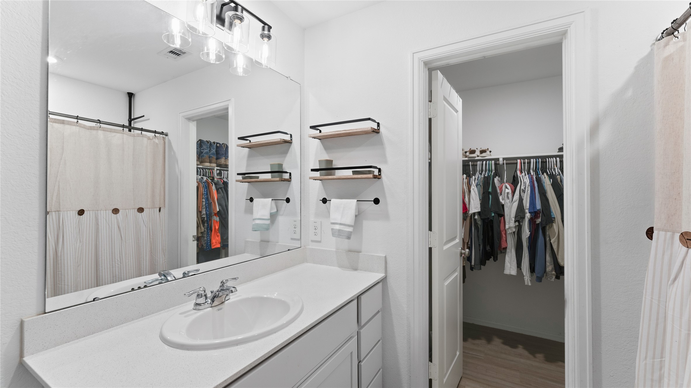 126 Spring Rose Drive Magnolia, TX 77354 - Photo 43 of 48 a bathroom with a sink vanity and shower