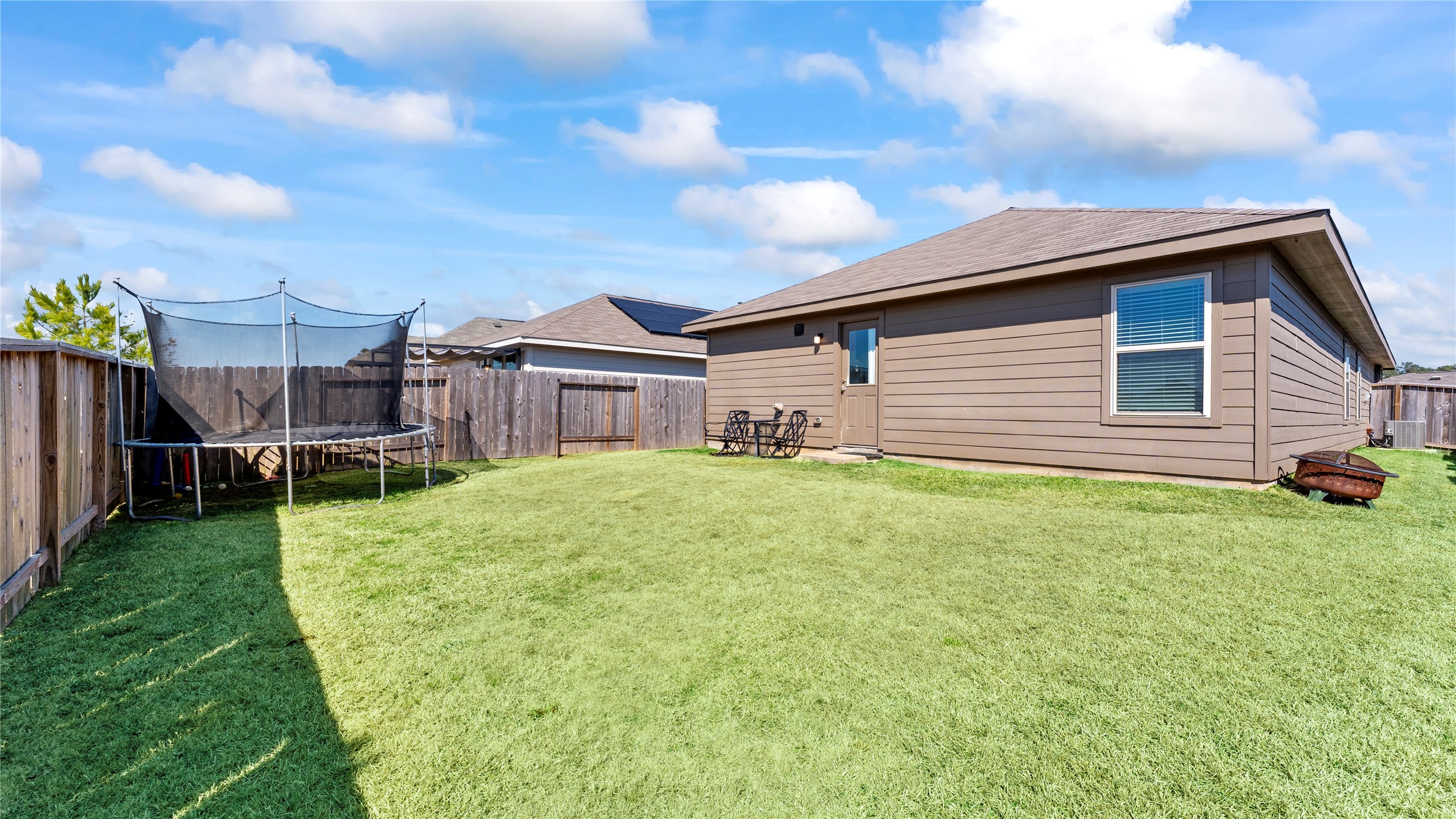 126 Spring Rose Drive Magnolia, TX 77354 - Photo 44 of 48 a house view with a garden space