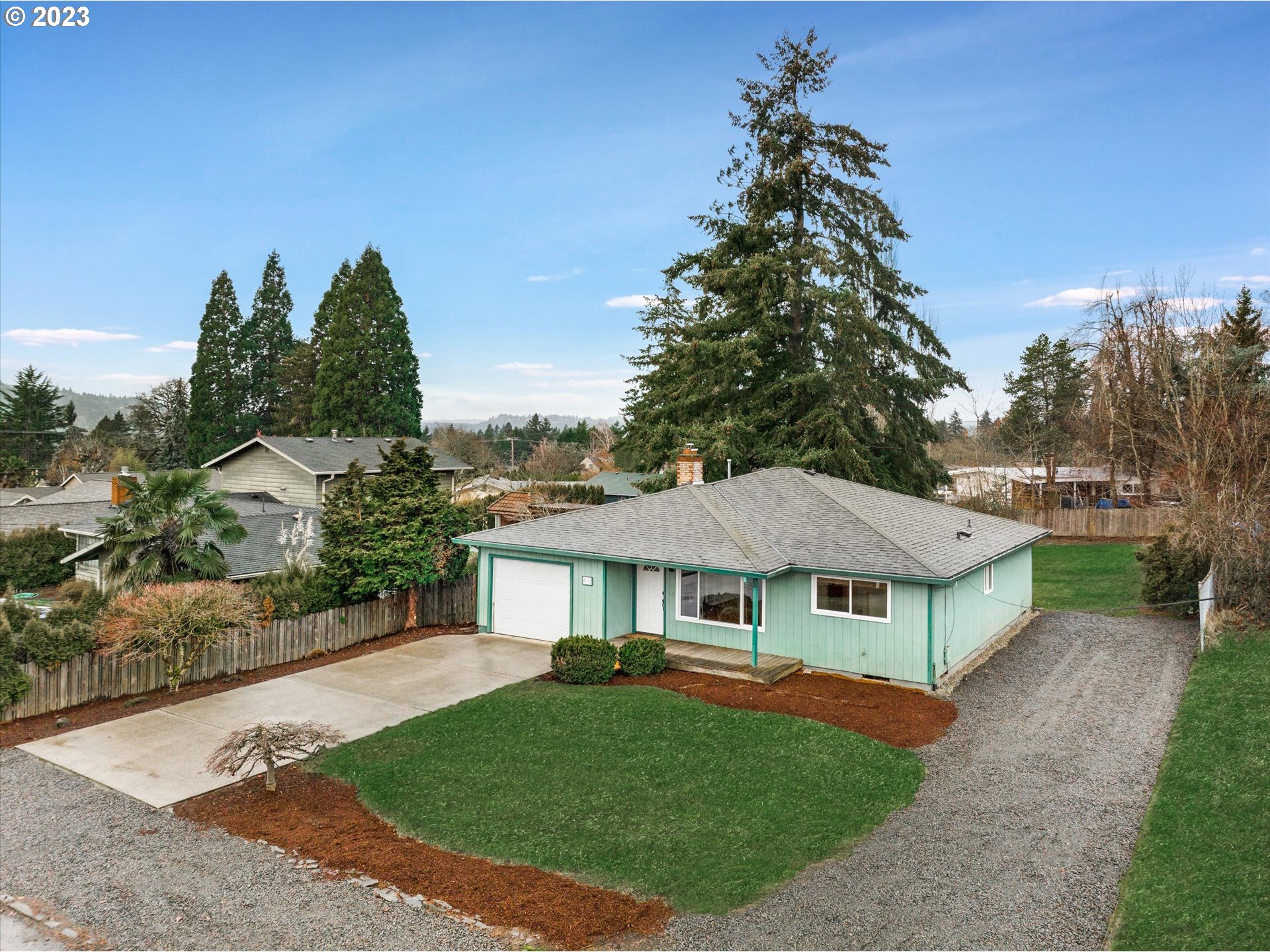 4011 Southeast View Acres Road Milwaukie, OR 97267 - Photo 3 of 19 a view of a house with a yard