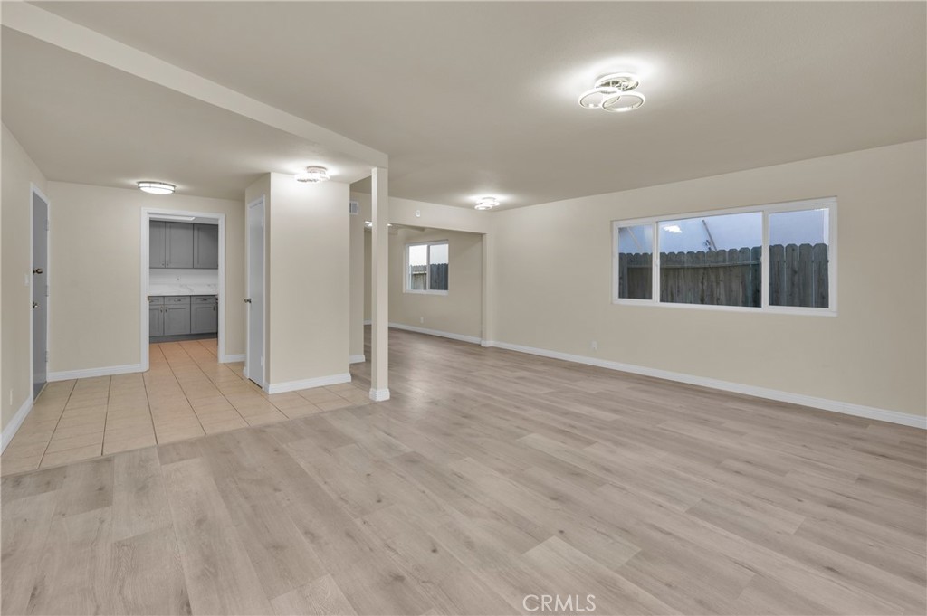 20537 East Vejar Road Walnut, CA 91789 - Photo 12 of 34 an empty room with wooden floor and windows