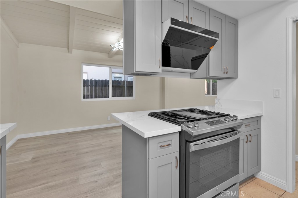 20537 East Vejar Road Walnut, CA 91789 - Photo 16 of 34 a kitchen with cabinets and a stove top oven