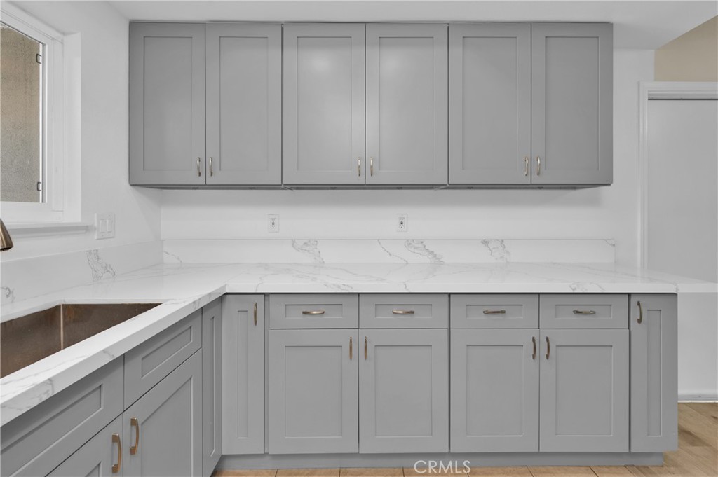 20537 East Vejar Road Walnut, CA 91789 - Photo 17 of 34 a kitchen with white cabinets