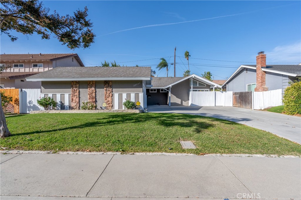 20537 East Vejar Road Walnut, CA 91789 - Photo 2 of 34 a front view of a house with a garden