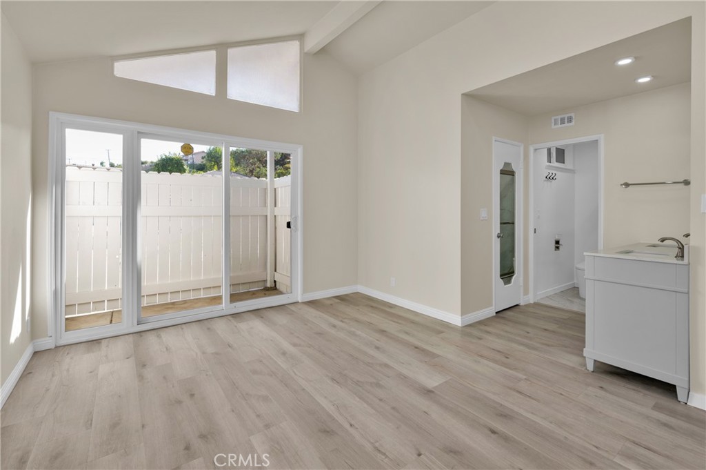 20537 East Vejar Road Walnut, CA 91789 - Photo 24 of 34 wooden floor in an empty room with a window