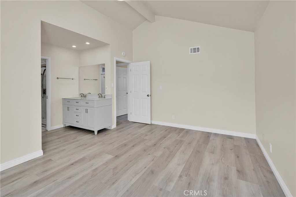 20537 East Vejar Road Walnut, CA 91789 - Photo 25 of 34 an empty room with wooden floor and windows