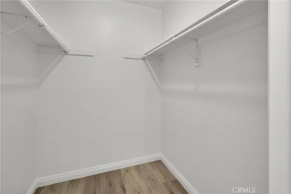 a view of an empty walk in closet