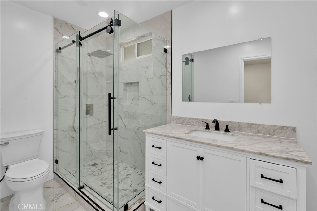 20537 East Vejar Road Walnut, CA 91789 - Photo 7 of 34 a bathroom with a shower sink vanity mirror and toilet