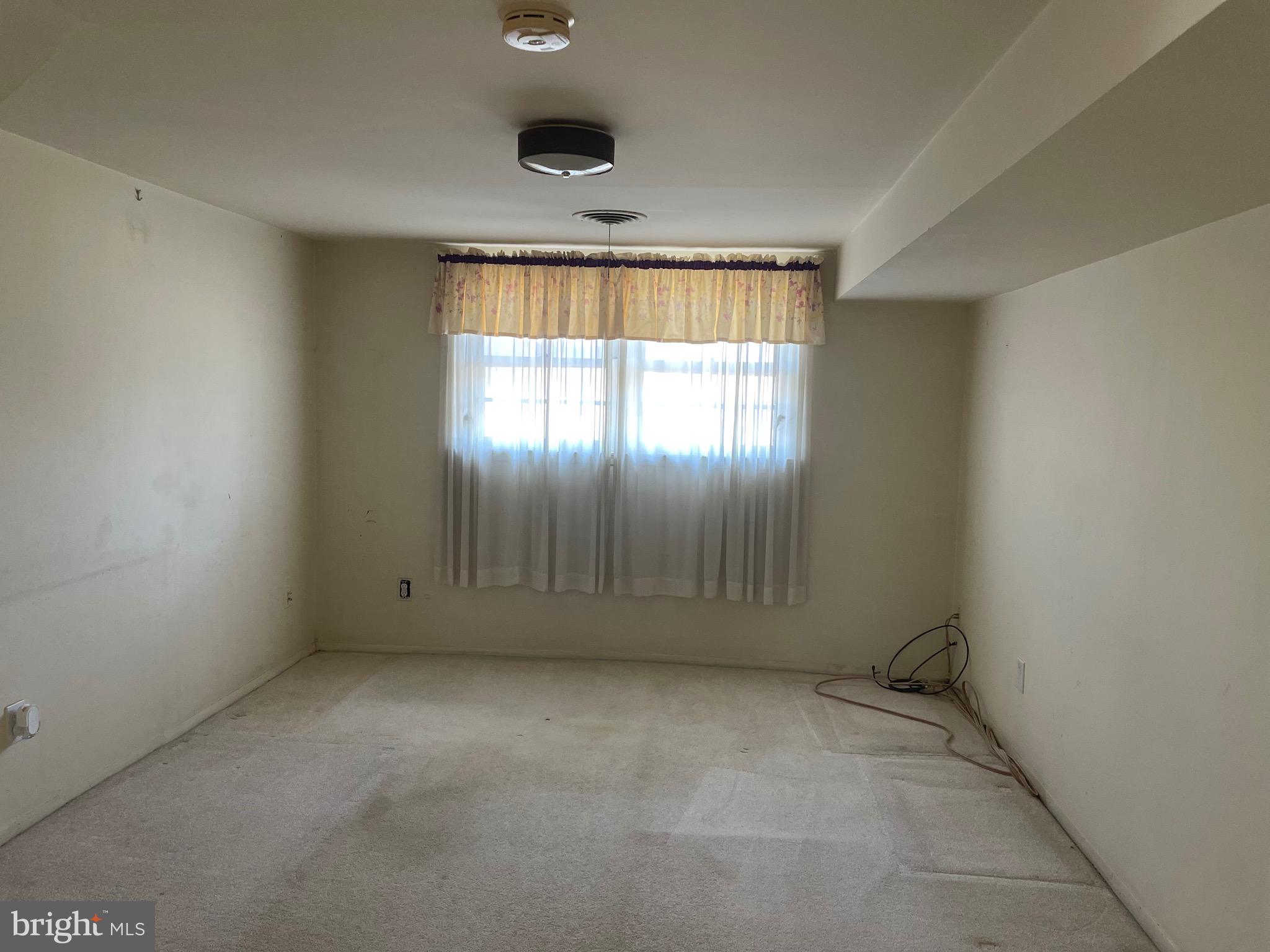 5409 Montgomery Street Springfield, VA 22151 - Photo 8 of 8 an empty room with windows
