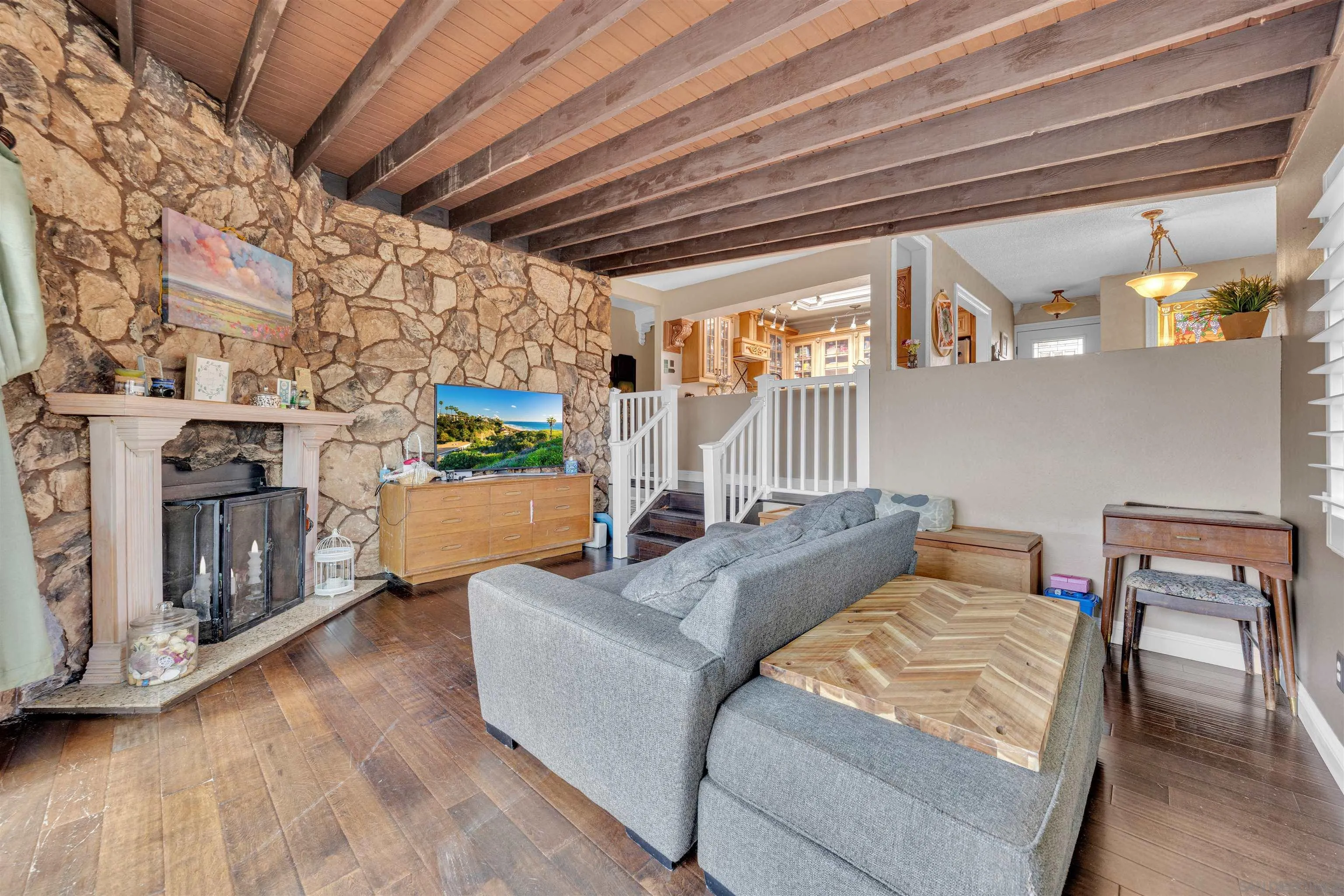1302 Paraiso Avenue Spring Valley, CA 91977 - Photo 11 of 34 a living room with furniture and a fireplace