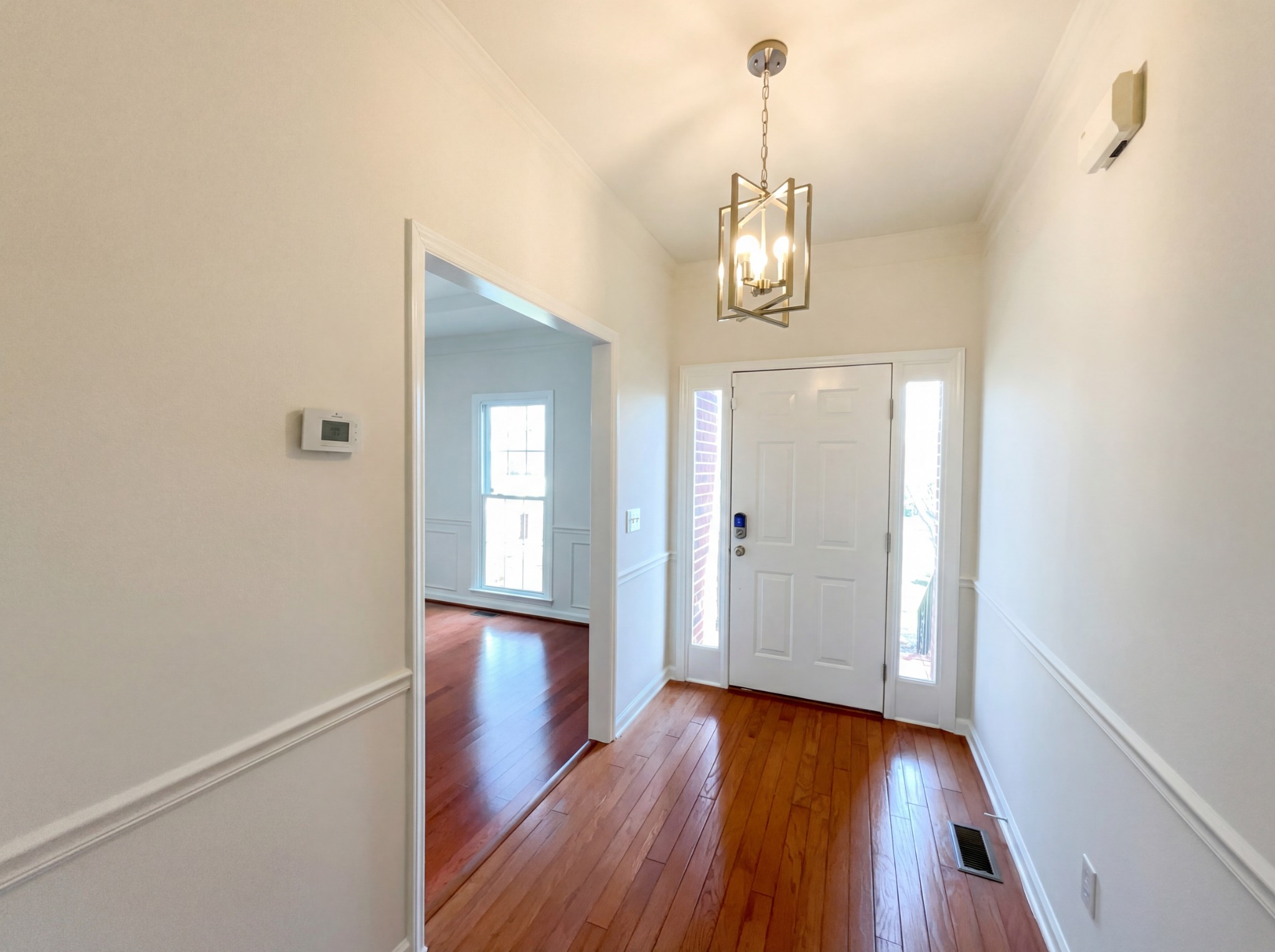 3106 Park Hill Road Murfreesboro, TN 37129 - Photo 10 of 28 a view of a hallway with wooden floor and staircase