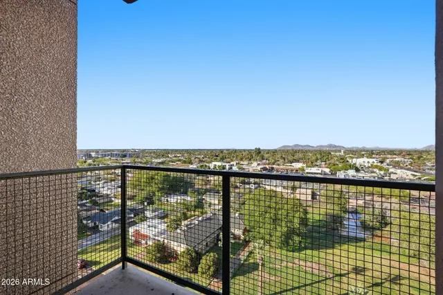 a bathroom with a shower and toilet
