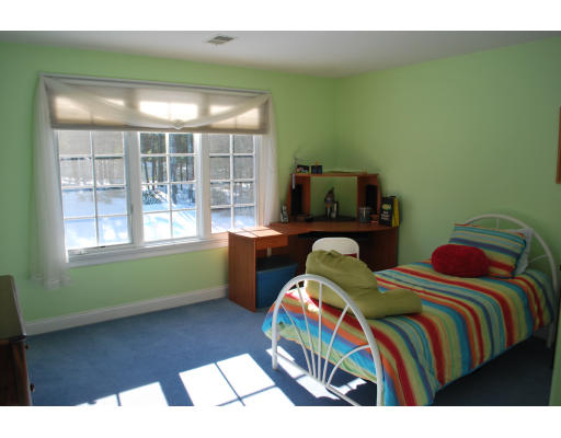 45 Amanda Road Sudbury, MA 01776 - Photo 17 of 22 a bedroom with two beds and a window