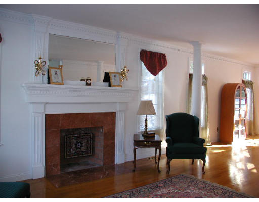 45 Amanda Road Sudbury, MA 01776 - Photo 5 of 22 a living room with furniture and a fireplace