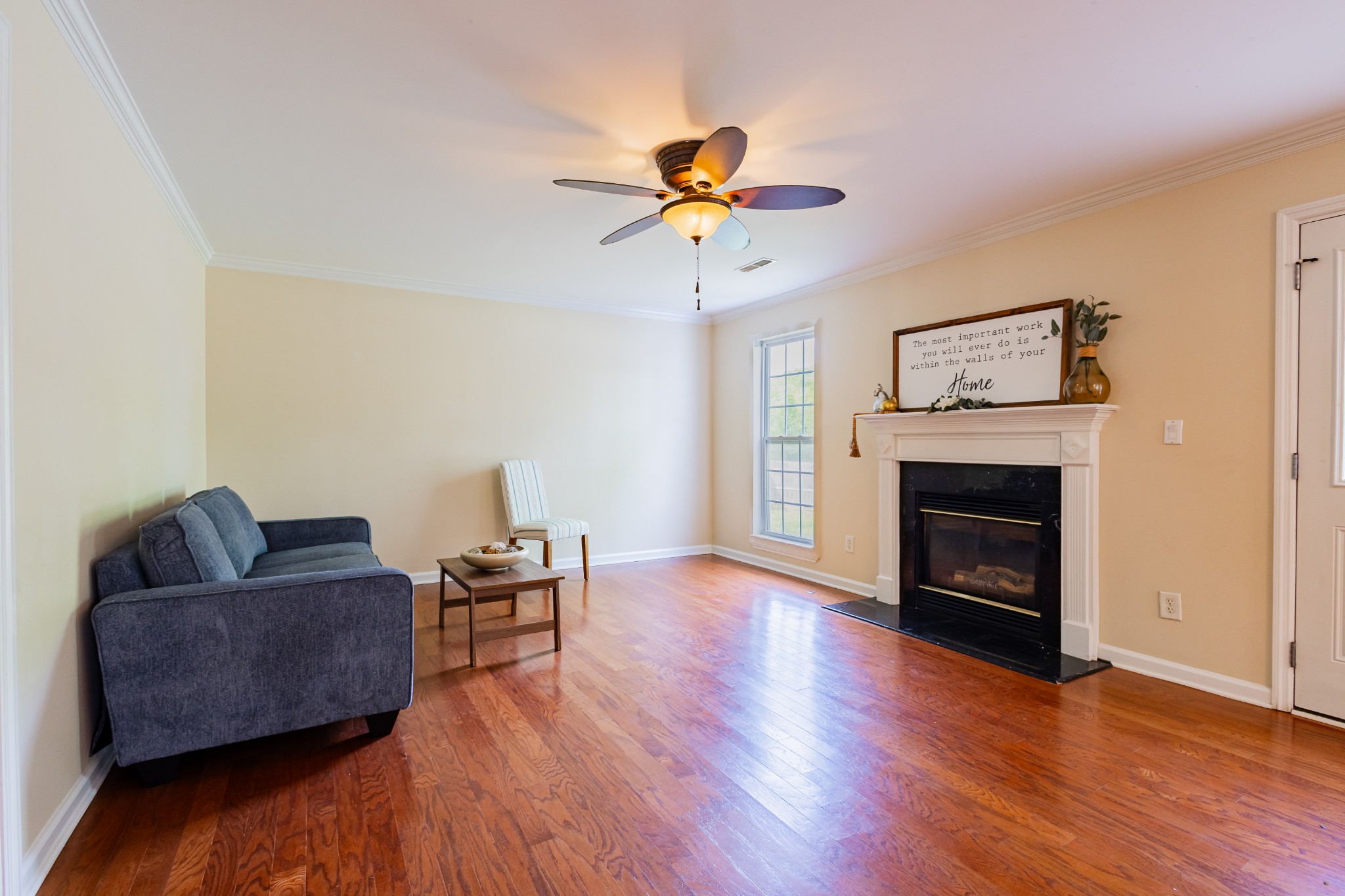 2236 Hayward Lane Spring Hill, TN 37174 - Photo 13 of 59 a living room with furniture and a fireplace