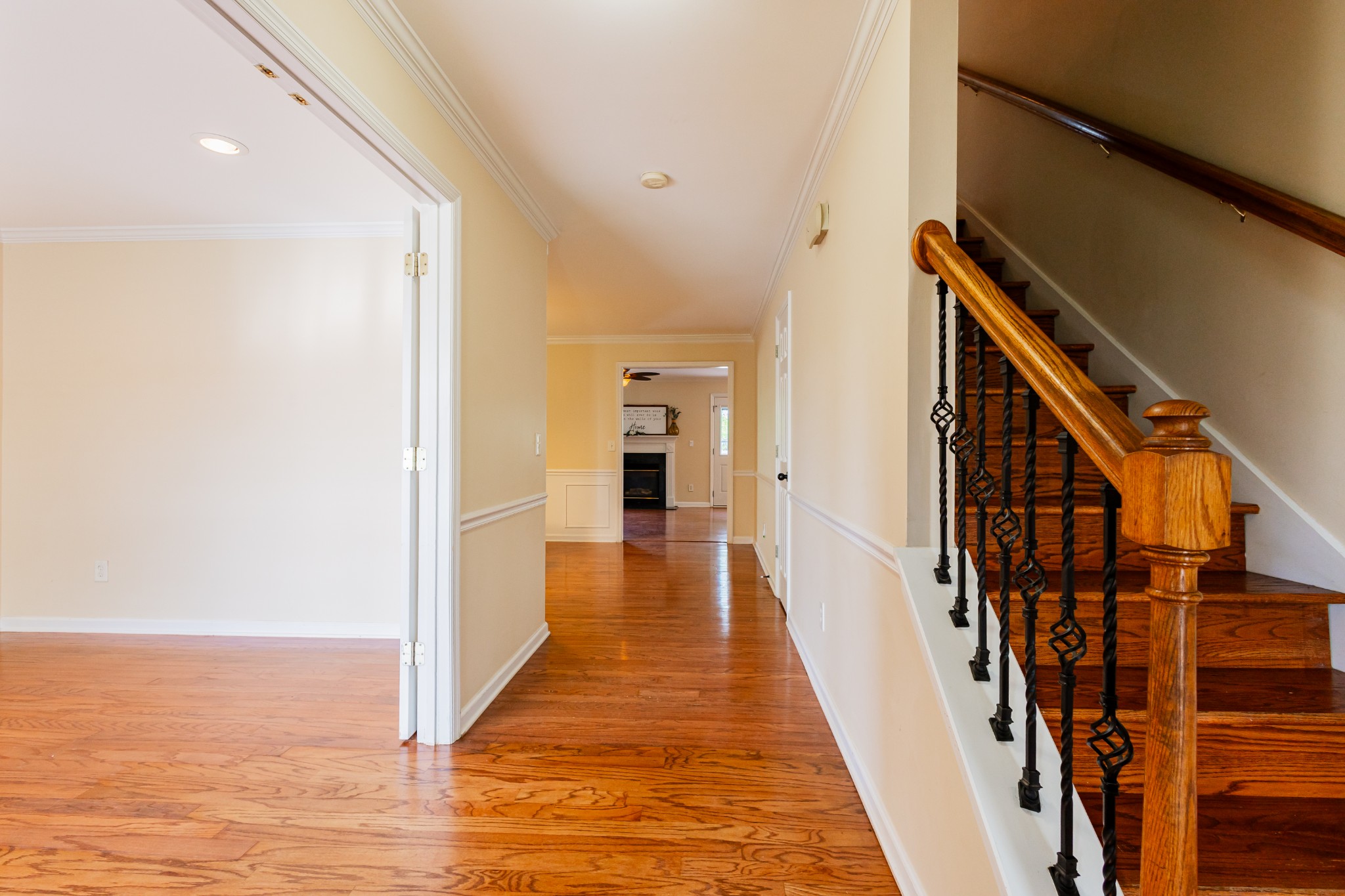 2236 Hayward Lane Spring Hill, TN 37174 - Photo 21 of 59 a view of a hallway with wooden floor and staircase