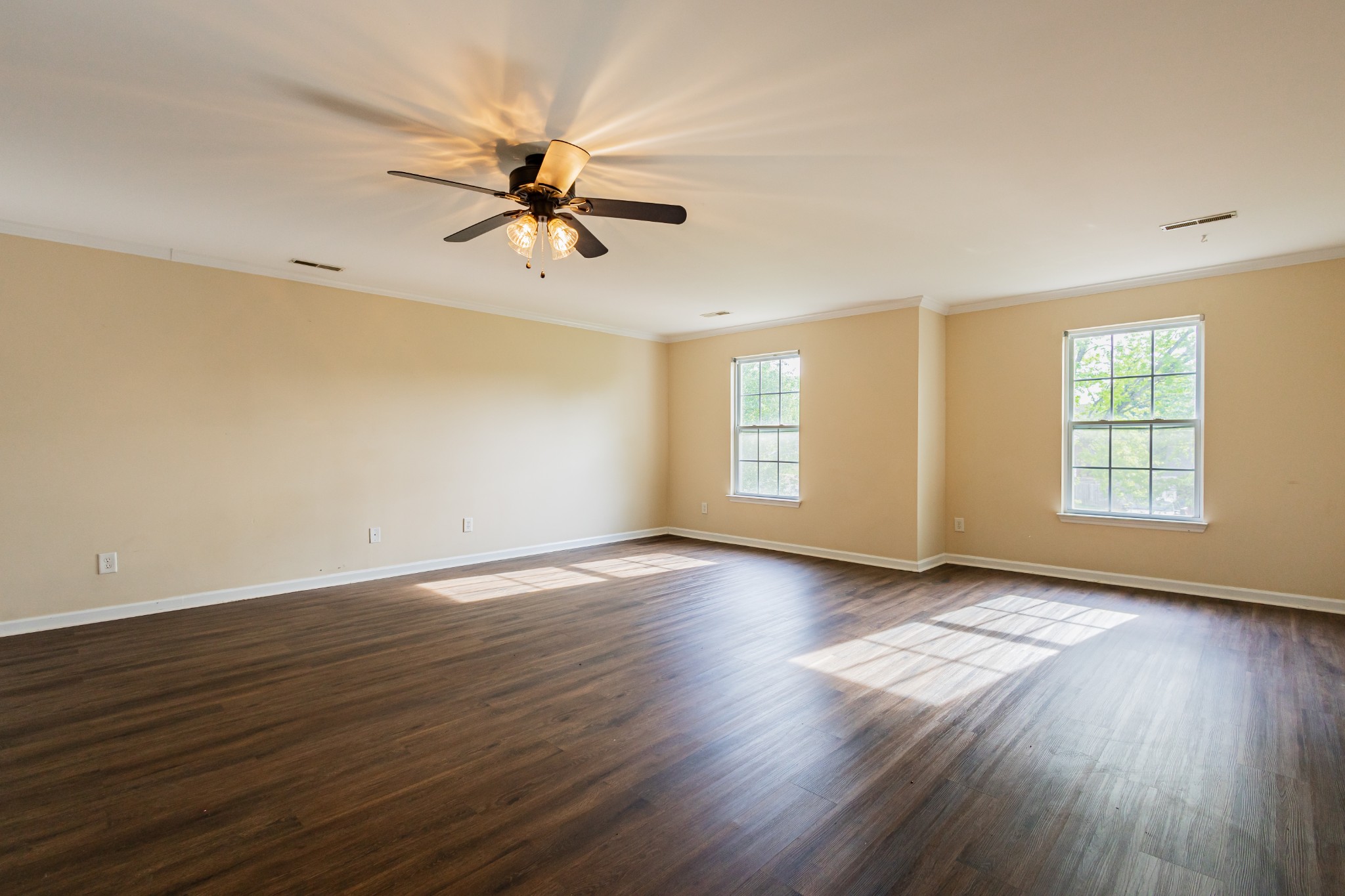 2236 Hayward Lane Spring Hill, TN 37174 - Photo 31 of 59 an empty room with wooden floor fan and windows