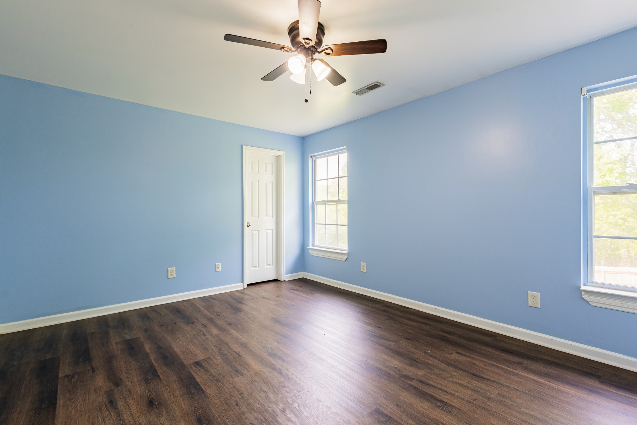 2236 Hayward Lane Spring Hill, TN 37174 - Photo 41 of 59 an empty room with wooden floor and windows