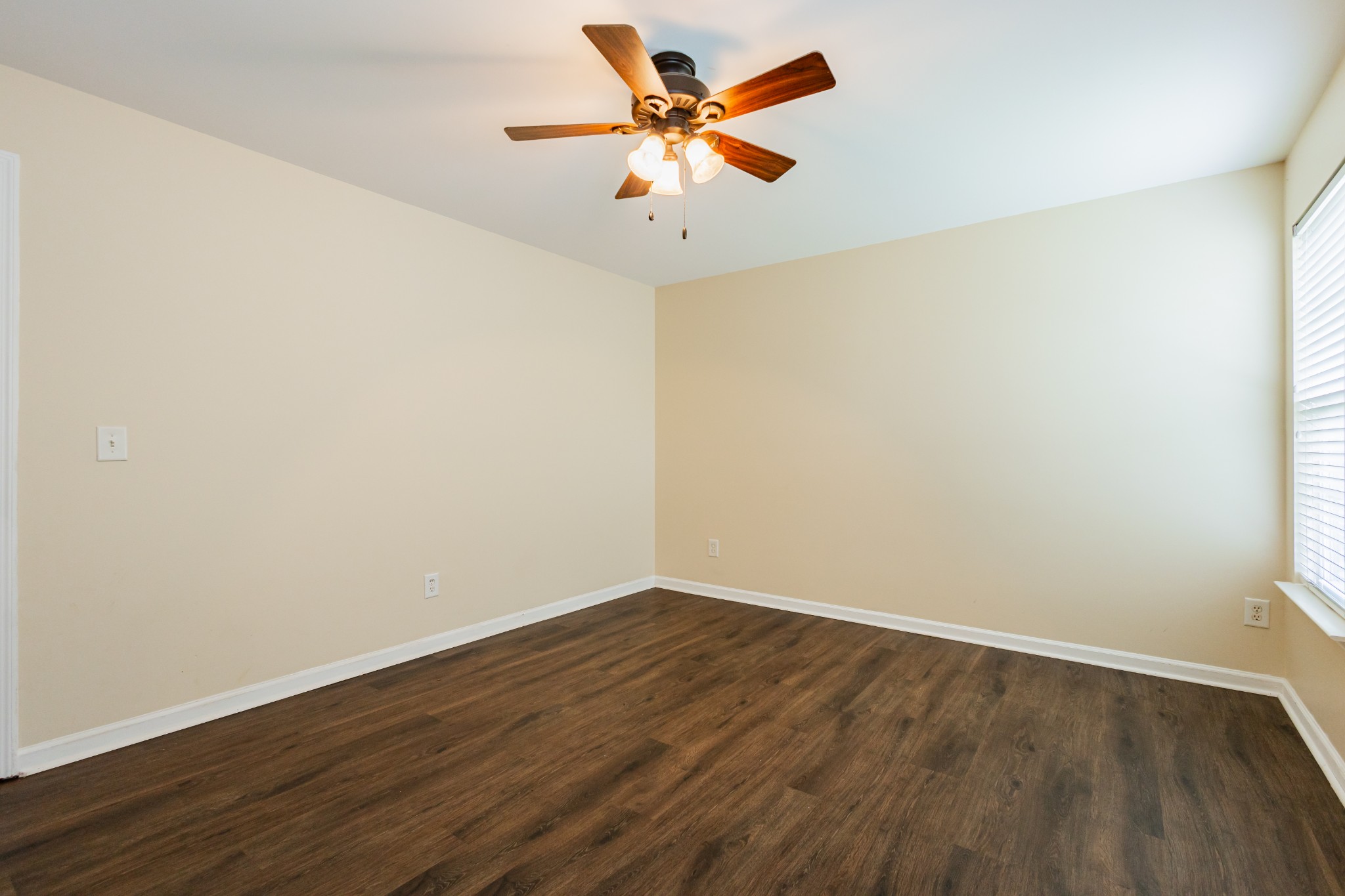 2236 Hayward Lane Spring Hill, TN 37174 - Photo 48 of 59 an empty room with wooden floor and a ceiling fan