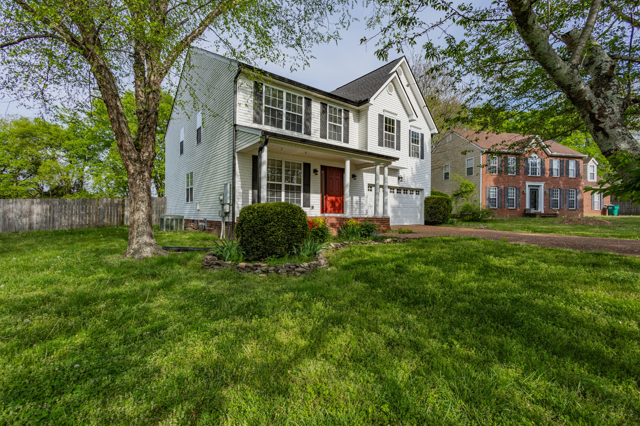 2236 Hayward Lane Spring Hill, TN 37174 - Photo 5 of 59 a front view of a house with a garden
