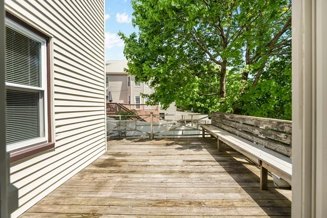 a view of a backyard with a patio