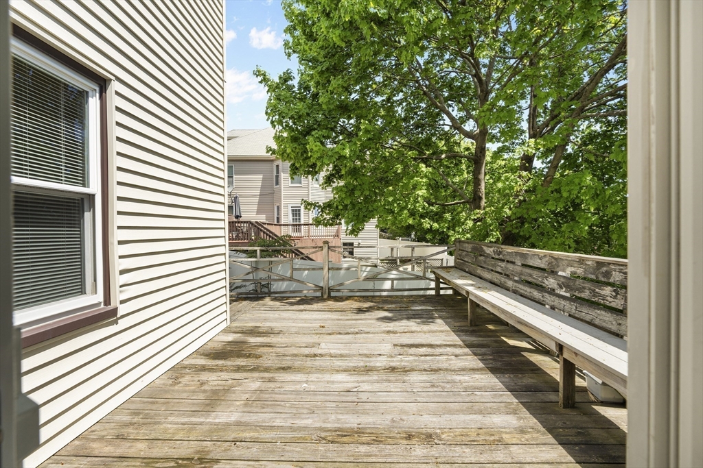 12 Folger Avenue, Unit 3 Beverly, MA 01915 - Photo 11 of 20 a view of a backyard with a patio