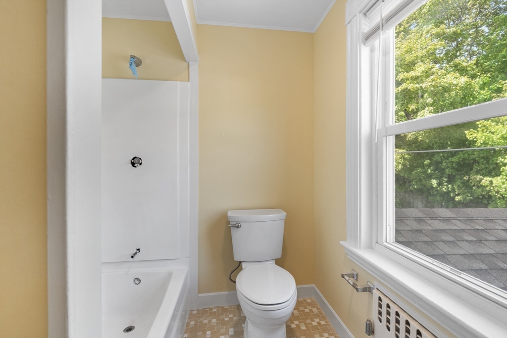 12 Folger Avenue, Unit 3 Beverly, MA 01915 - Photo 16 of 20 a bathroom with a toilet and a sink