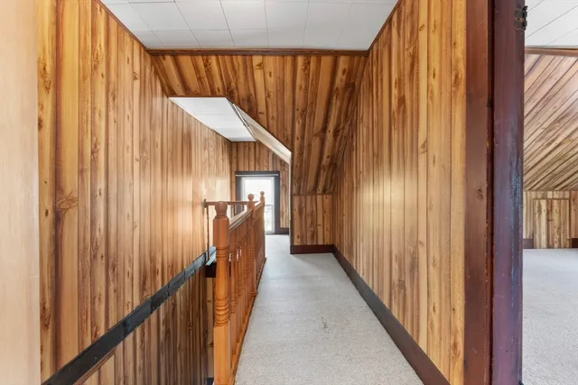 a view of a room with a wooden walls