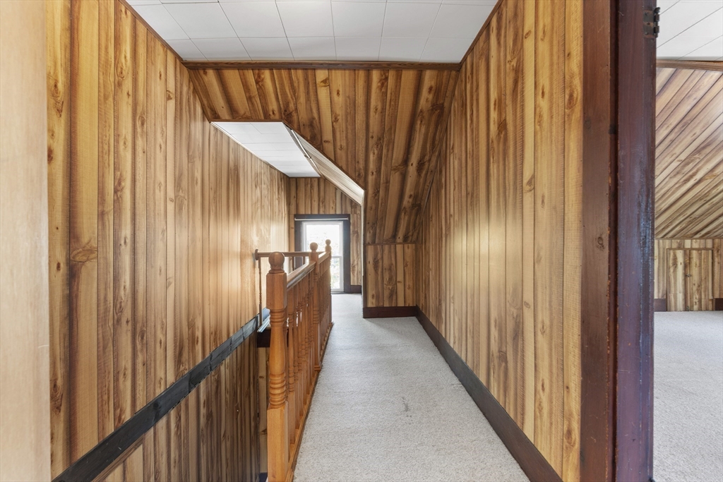12 Folger Avenue, Unit 3 Beverly, MA 01915 - Photo 17 of 20 a view of a room with a wooden walls