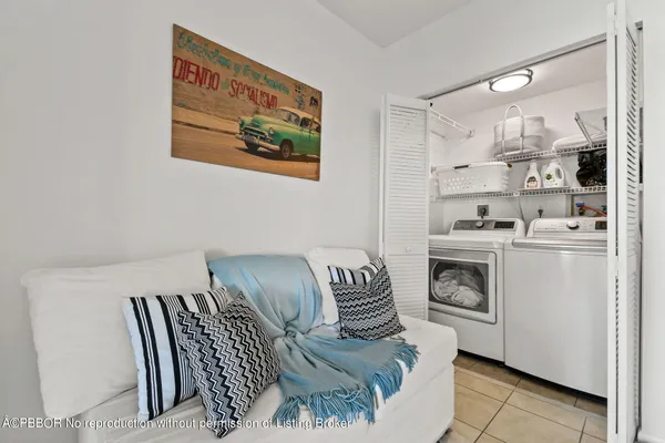 a bed room with a bed and a television