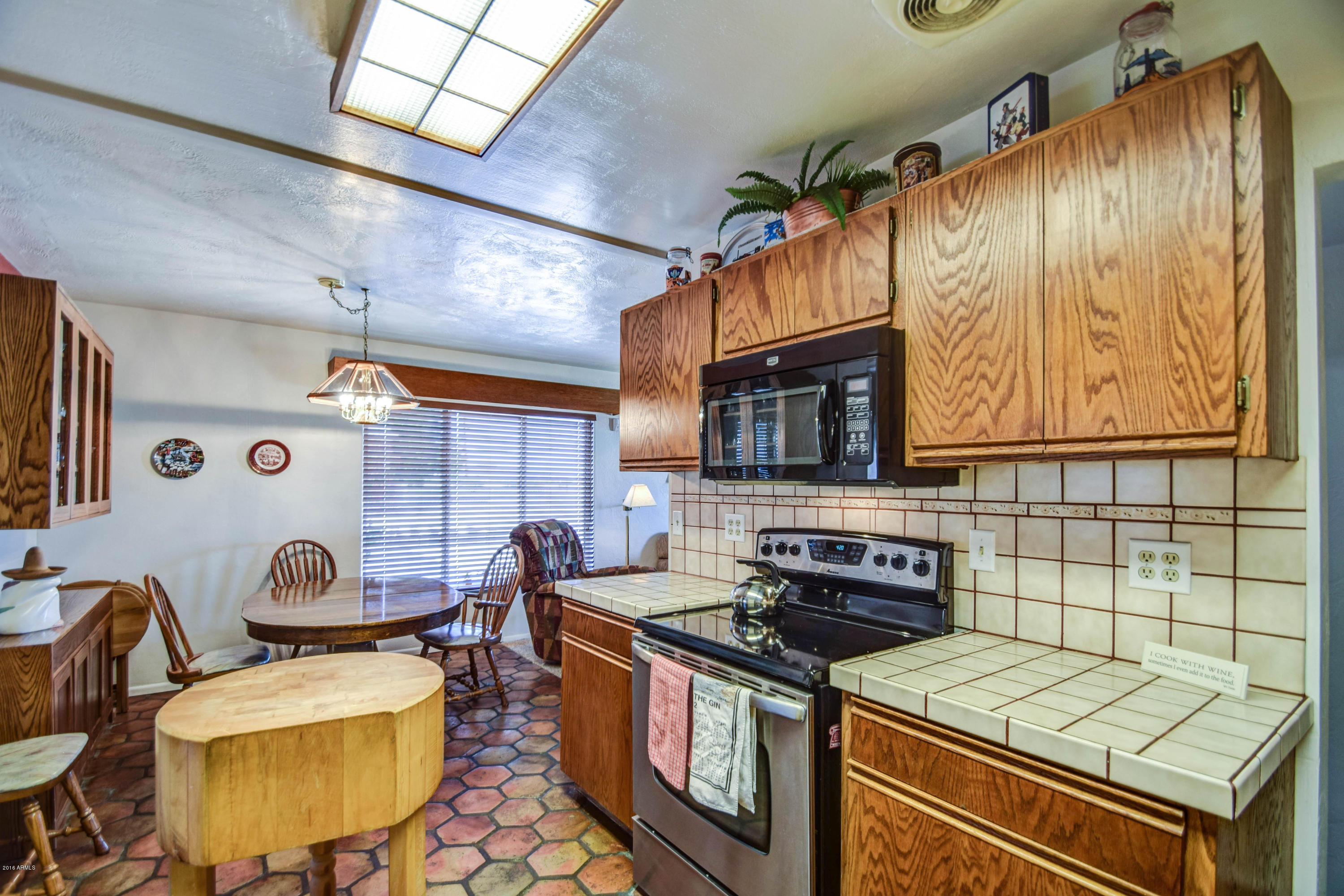 256 North Apache Road Buckeye, AZ 85326 - Photo 13 of 53 Kitchen opens to the breakfast nook