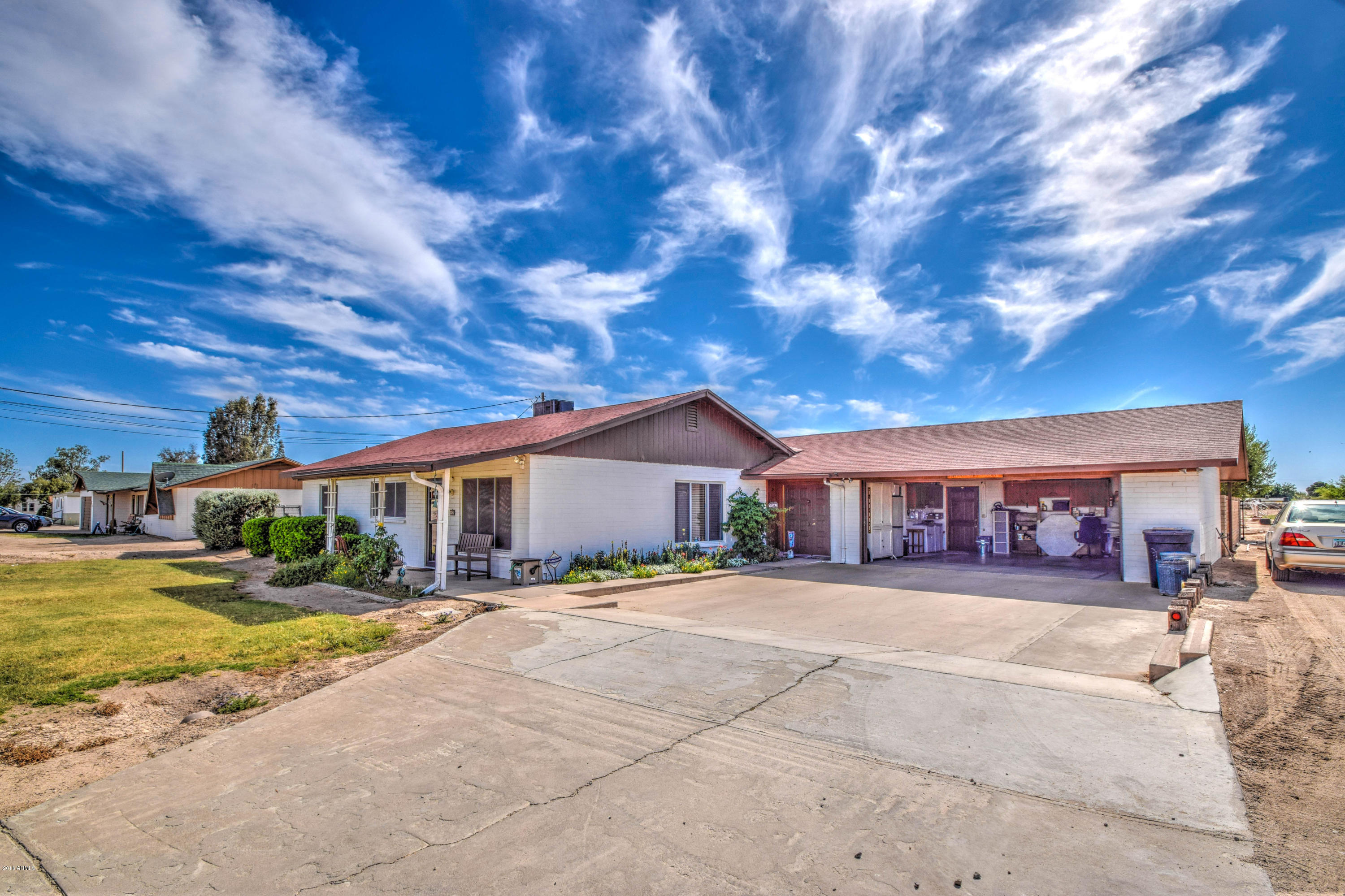 256 North Apache Road Buckeye, AZ 85326 - Photo 4 of 53 Spacious 2 car garage