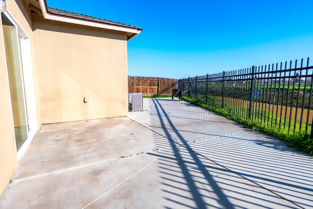 an aerial view of a house with garden