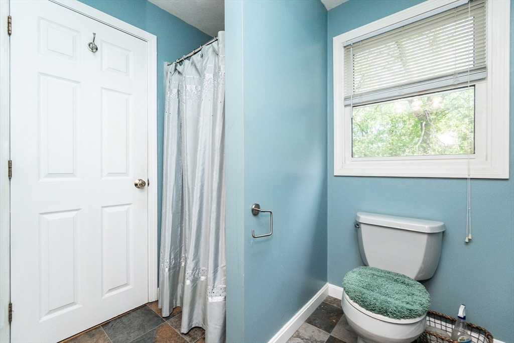 63 Bow Street Saugus, MA 01906 - Photo 25 of 42 a bathroom with a toilet and a shower