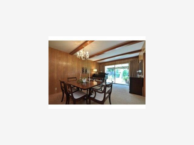 490 Patrick Way Los Altos, CA 94022 - Photo 3 of 9 a dining room with furniture and a potted plant