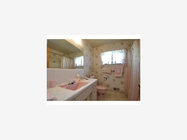 490 Patrick Way Los Altos, CA 94022 - Photo 8 of 9 a bathroom with a sink mirror and a bathtub