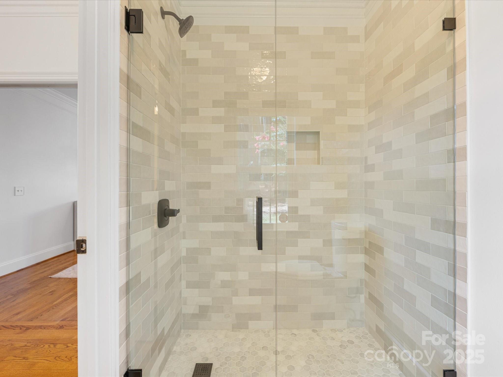 11215 Idlewild Road Matthews, NC 28105 - Photo 21 of 48 a bathroom with a shower