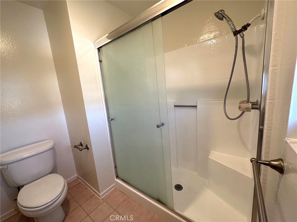 11705 Ramona Boulevard El Monte, CA 91732 - Photo 8 of 15 a bathroom with a shower and toilet