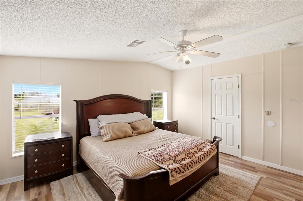 12368 Lexington Place Arcadia, FL 34269 - Photo 11 of 31 a bedroom with a bed and a closet