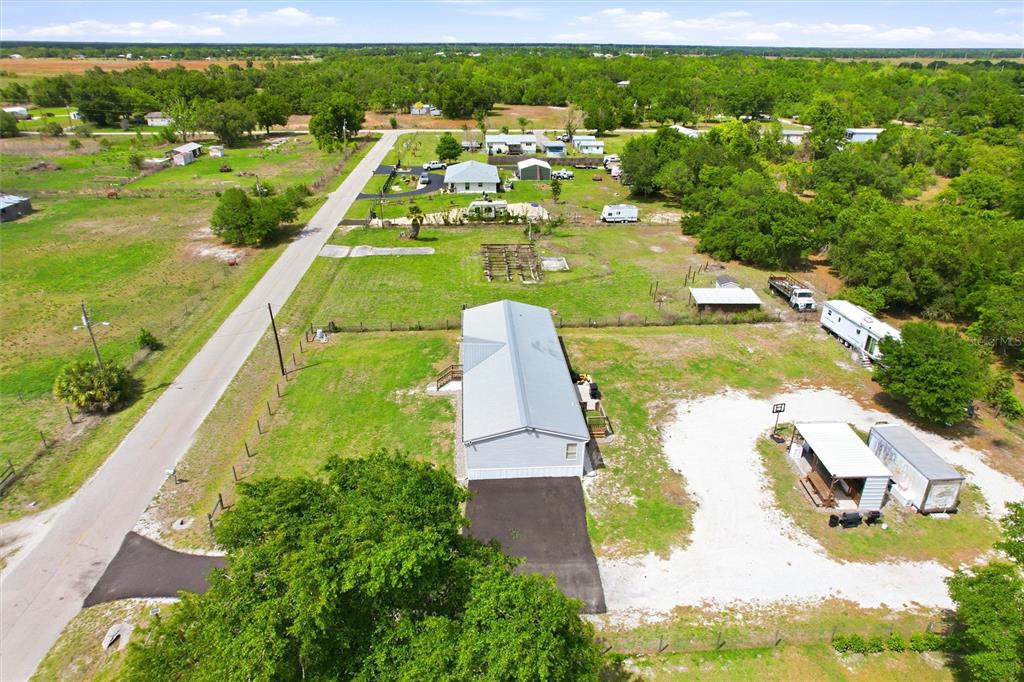 12368 Lexington Place Arcadia, FL 34269 - Photo 24 of 31 a view of a yard with an outdoor space