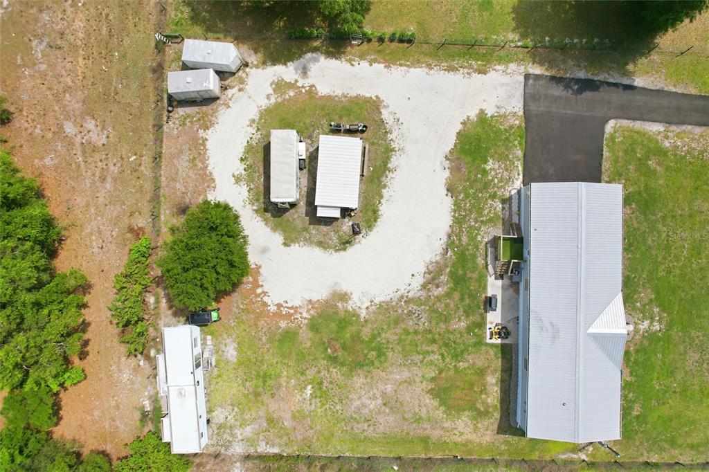 12368 Lexington Place Arcadia, FL 34269 - Photo 28 of 31 an aerial view of a house with yard swimming pool and outdoor seating