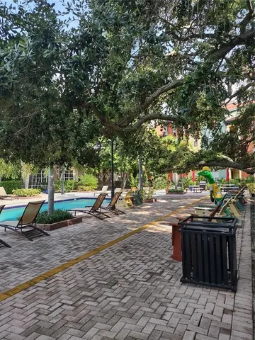 a view of a pathway with a building in the background