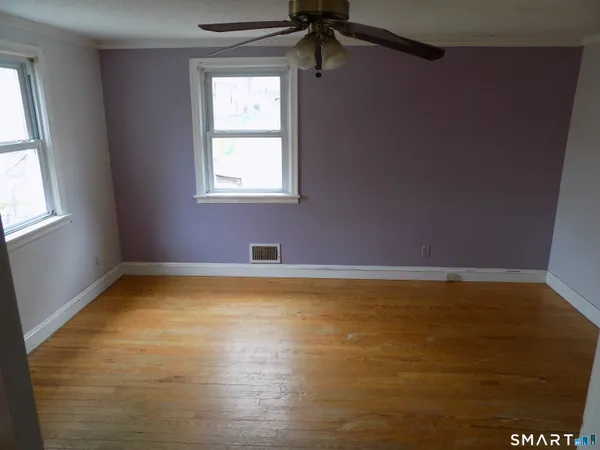 a view of a room that has a window in it