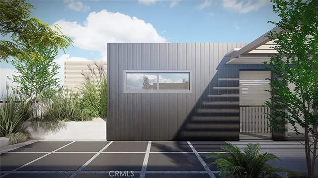 a backyard of a house with plants and outdoor space