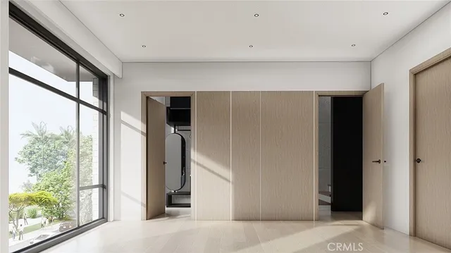 a view of a hallway with wooden shelves